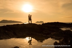 couple at kalim beach , phuket , thailand