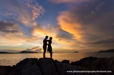 couple at kalim beach , phuket , thailand